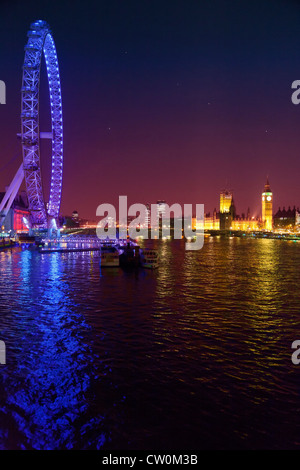 Le Palais de Westminster, le London Eye de nuit Banque D'Images