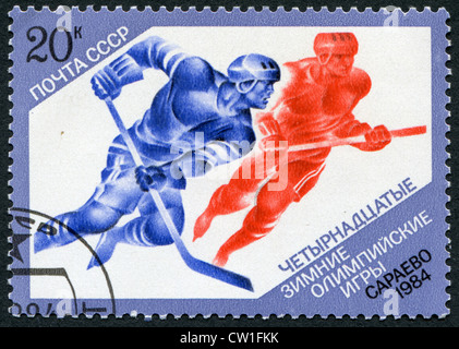 Urss - circa 1984 : timbres-poste imprimés dans l'URSS, montre la XIV jeux Olympiques d'hiver à Sarajevo, hockey, vers 1984 Banque D'Images