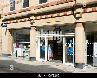 Bottes store dans King Street Manchester UK Banque D'Images