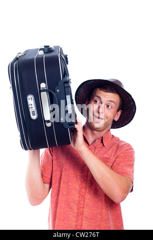 Les jeunes professionnels heureux homme voyageant avec des bagages, isolé sur fond blanc. Banque D'Images