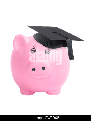 Piggy Bank wearing graduation - mortier pour économiser concept universitaire Banque D'Images