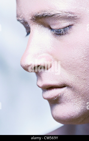 Portrait of a young man looking down Banque D'Images