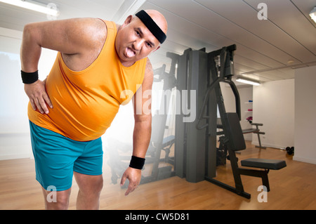 Grande fatigue et d'une douleur de l'homme remise en forme Banque D'Images