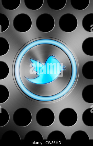 Icône Bouton twitter rougeoyant bleu sur un Mac d'Apple en aluminium brossé style background image concept. Banque D'Images