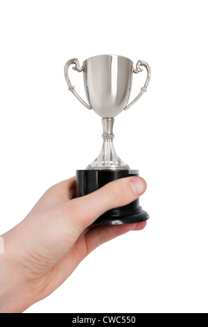 Portrait of man's hand holding trophy gagnante sur fond blanc Banque D'Images