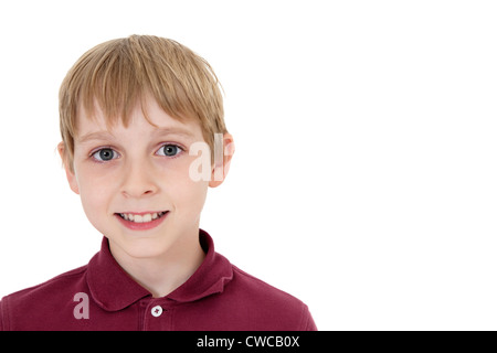 Close-up portrait of a happy pre-teen boy over white background Banque D'Images