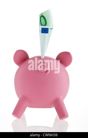 Pink piggy bank avec un billet Banque D'Images