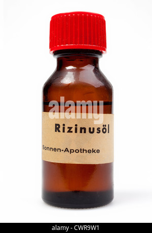 Le ricin (Ricinus communis), petite bouteille avec de l'huile Banque D'Images