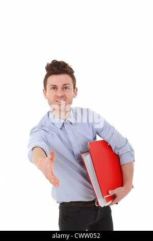 Portrait de jeune homme accueillant isolé dans office holding folders Banque D'Images