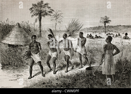 Vieille illustration d'esclaves dans la région Unyamwezi, Tanzanie Banque D'Images