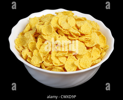 Dans une tasse de flocons blancs sur fond noir, isolé Banque D'Images