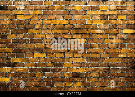 Mur de briques. Vintage texture dans des tons brun-jaune. Banque D'Images