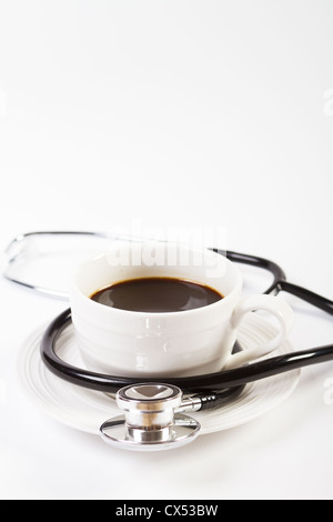Stéthoscope sur une tasse de café Banque D'Images