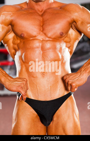 Male bodybuilder muscle du corps libre Banque D'Images