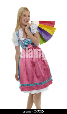 Woman in Dirndl with Shopping Bags Banque D'Images