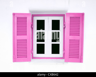 Style grec rose windows sur mur blanc Banque D'Images