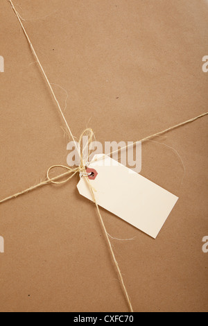 Le papier kraft brun avec de la ficelle d'arrière-plan Banque D'Images