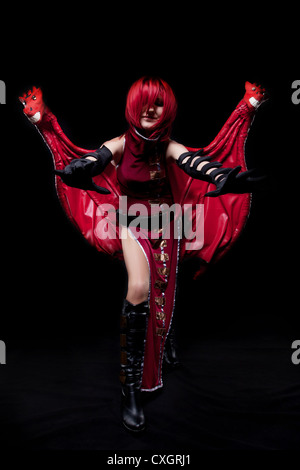 Fureur rouge cosplay girl anime character Banque D'Images