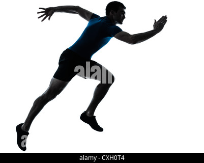 Un homme de race blanche runner sprinter course sprint en silhouette studio isolé sur fond blanc Banque D'Images