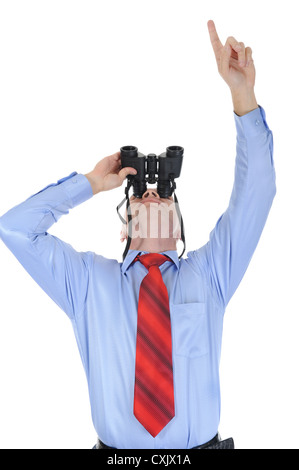 Businessman looking through binoculars Banque D'Images