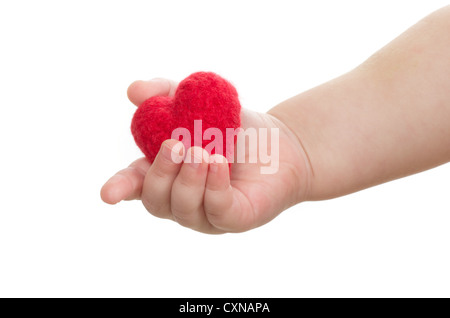 La main de l'enfant avec un cœur rouge Banque D'Images