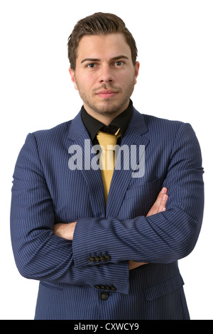 Un jeune homme d'affaires rigoureux dans un costume bleu avec une cravate d'or Banque D'Images