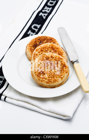 Crumpet beurré grillé Banque D'Images