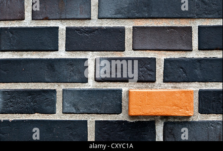 Mur de brique, briques et un noir orange brique, Hambourg Banque D'Images