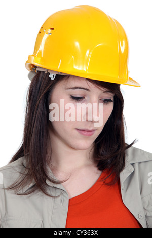 Une triste femme travailleur de la construction. Banque D'Images