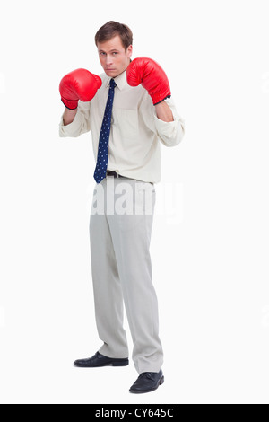 Businessman avec ses gants de boxe prêt à combattre Banque D'Images