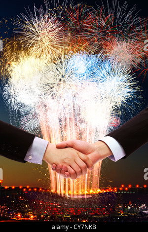 Business people shaking hands in le National Indoor Stadium Banque D'Images