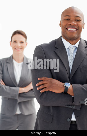 Homme rire en face de peuplements businesswoman Banque D'Images