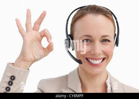 Femme en costume portant un casque est l'approbation Banque D'Images