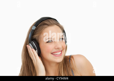 Close-up of a smiling student wearing headphones Banque D'Images