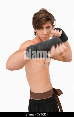 En pratiquant de combat combats posent Banque D'Images