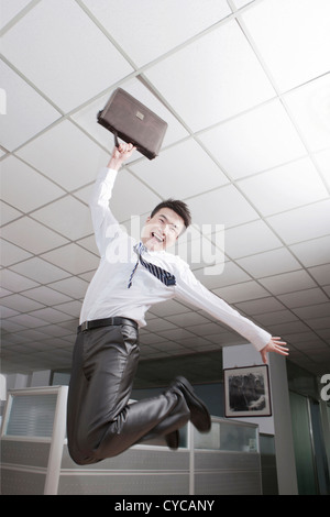 Businessman Jumping Banque D'Images