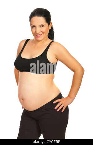 Smiling pregnant woman prêt pour la remise en forme isolé sur fond blanc Banque D'Images