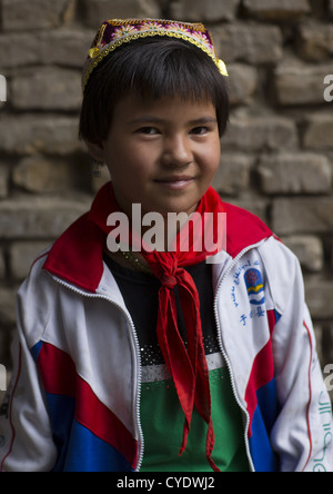 Jeune fille, pionnier ouïghour Keriya, Vieille Ville, Keriya, la région autonome ouïghoure du Xinjiang, Chine Banque D'Images