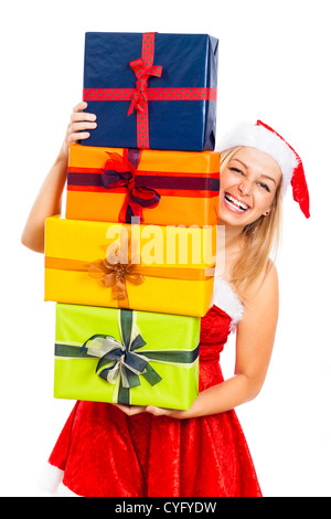 Young attractive blonde laughing woman in Santa costume holding de nombreux cadeaux de Noël coloré, isolé sur fond blanc. Banque D'Images