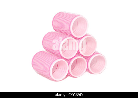 Six rouleaux velcro rose empilées dans une pyramide, isolé sur fond blanc Banque D'Images
