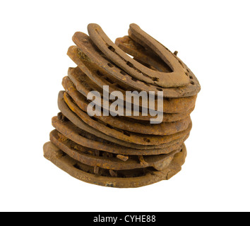 Pile de vieux rétro chaussures cheval isolé sur fond blanc Banque D'Images