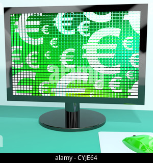 Symboles de l'euro sur l'écran de l'ordinateur montrant l'argent ou des investissements. Banque D'Images