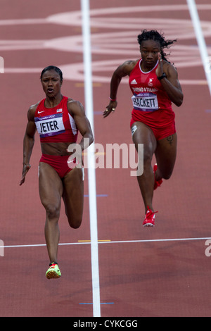 Carmelita Jeter (USA) qui se font concurrence sur les femmes à demi-finale du 100 mètres des Jeux Olympiques d'été, Londres 2012 Banque D'Images