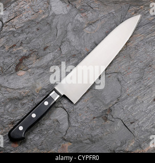 Couteau sur fond d'ardoise Banque D'Images