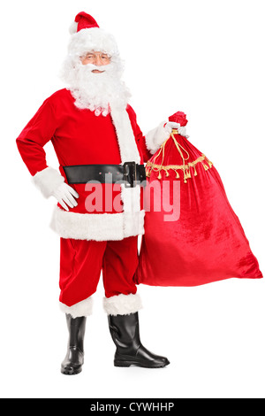 Portrait d'un Père Noël tenant un sac plein de cadeaux isolé sur fond blanc Banque D'Images