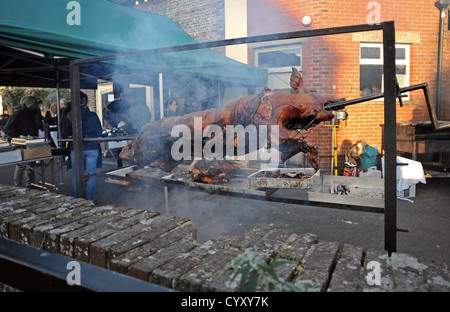 Rôti de porc à la broche tourne Banque D'Images