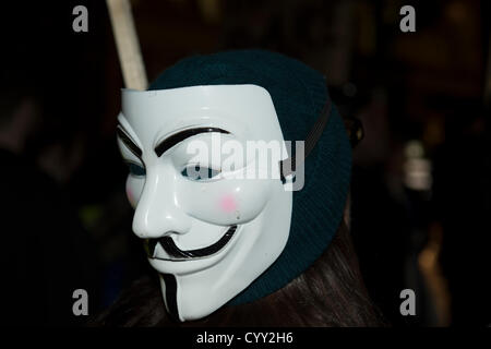 12 novembre 2012, Guildhall, Londres, Royaume-Uni. Comme le maire de Londres organise un banquet pour les banquiers et les hommes d'affaires de la ville, une manifestation contre l'austérité l'a lieu d'en face. PIIGS nommée et plèbe de Londres. PIIGS sont le peuple du Portugal, Italie, Irlande, Grèce et Espagne, ces pays qui ont le plus souffert en raison de la coupe. Banque D'Images