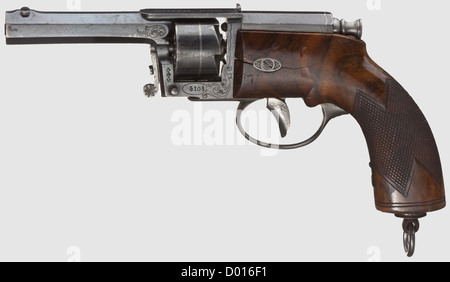 Un revolver allemand à aiguilles, F. von Dreyse,Sömmerda,vers 1860. CAL..35'. Numéro de série 5104. Canon octogonal rifud et légèrement surbagé avec alésage brillant. Données du fabricant sur le pont de châssis, châssis avec gravure modeste et calibre sur le côté droit. Aiguille manquante, mécanisme d'allumage défectueux, bleuissement usé et bosselé à des endroits. Cadre de prise avec anneau de contrôle fin et boucle de cordon, fissure de pression sur la gauche. Longueur 37 cm,historique,historique,19e siècle,arme de poing civile,armes de poing,pistolet,armes,arme,arme,arme,arme,arme,arme,armes,armes,droits additionnels-autorisations-non disponible Banque D'Images