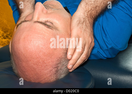 Praticien de Reiki au travail Banque D'Images