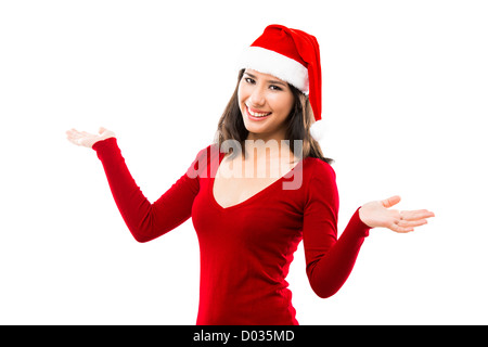 Beautiful Asian woman wearing Santa hat avec les bras ouverts, isolated on white Banque D'Images